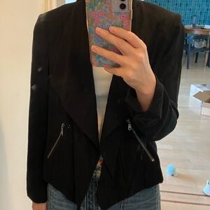 cropped blazer with a loose drapey fit
